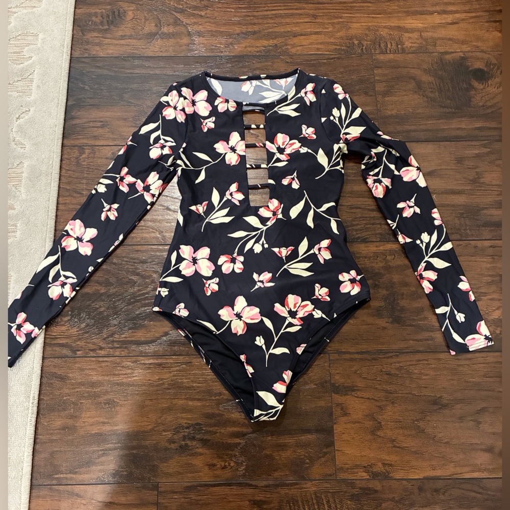 Sexy backless Floral print Billabong one piece with matching shorts.
